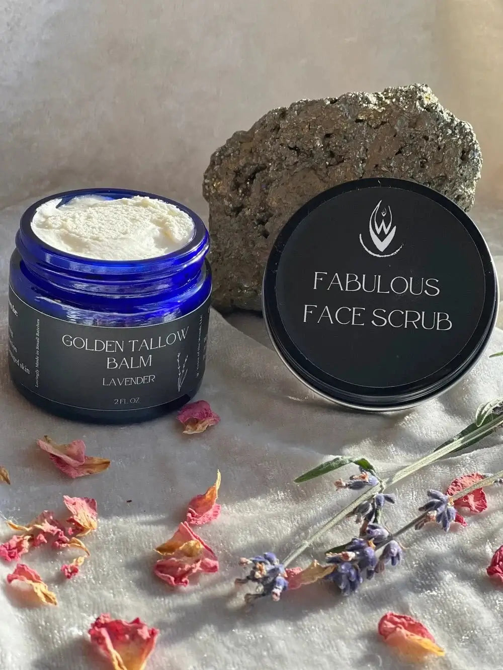 Moisturizing Tallow Duo Dry Skin products with Golden Tallow Balm and Fabulous Face Scrub on a textured surface.