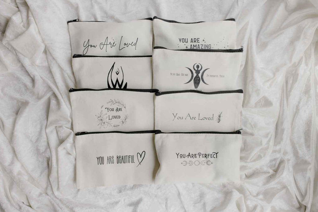 Menstrual Starter Kit Tween Period Supplies featuring black pouches with inspirational gold fonts.